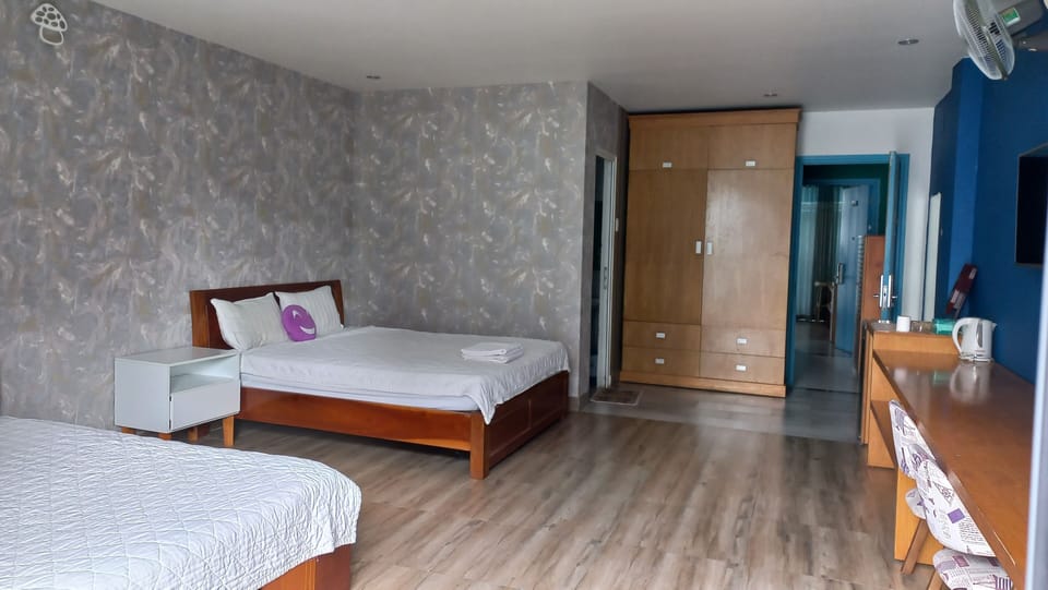 Deluxe Quadruple Room | Individually decorated, individually furnished, desk, blackout drapes