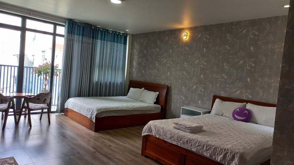 Deluxe Quadruple Room | Individually decorated, individually furnished, desk, blackout drapes