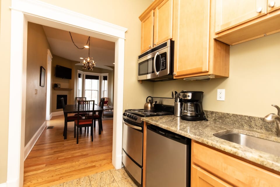 Superior Suite | Private kitchen | Mini-fridge, microwave, coffee/tea maker, electric kettle