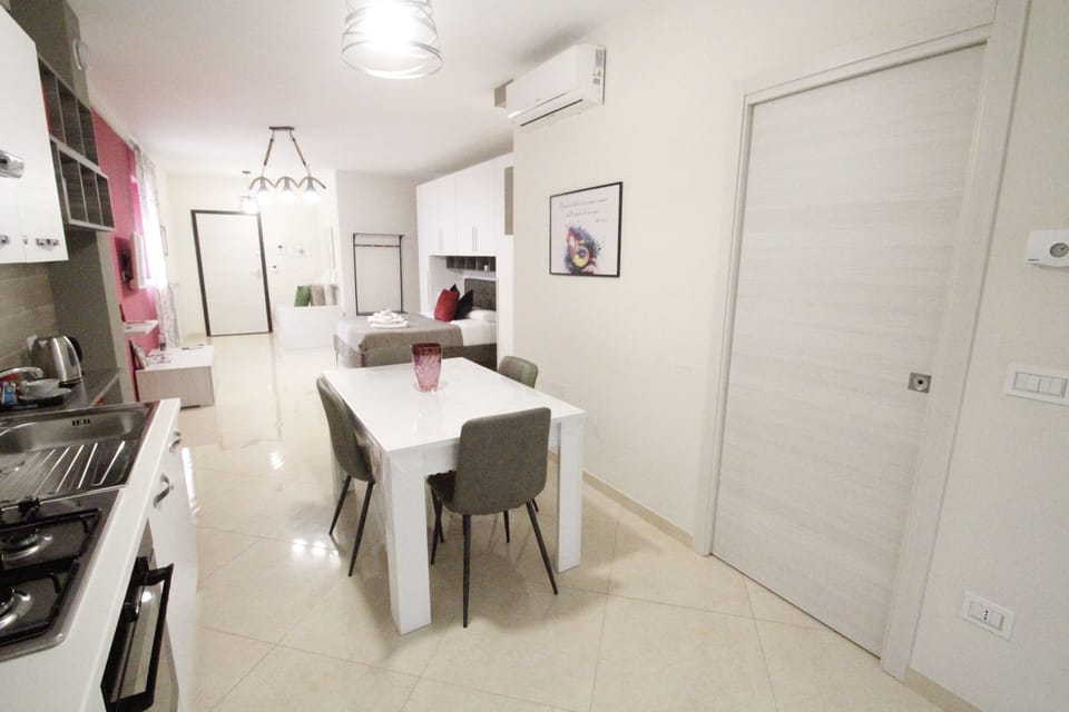 Family Quadruple Room, 1 Bedroom, City View | In-room dining