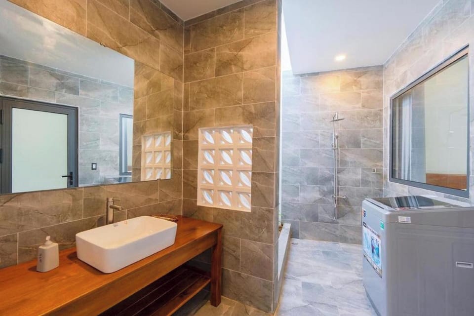 Family Villa, Pool View | Bathroom | Hair dryer, bidet, towels