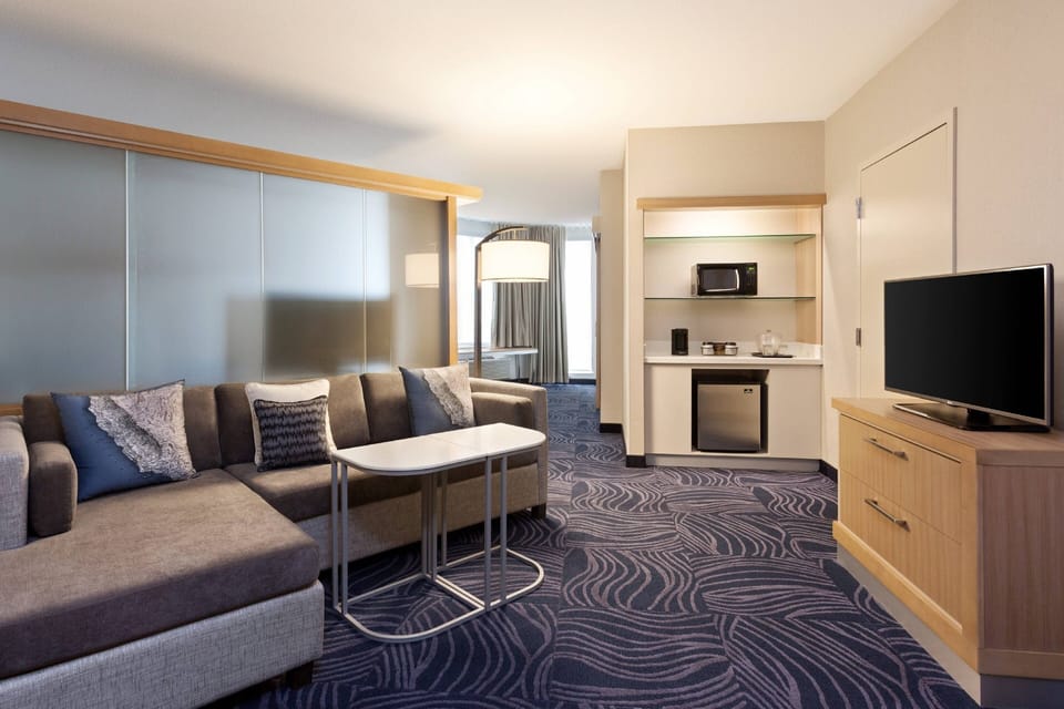 Suite, 1 King Bed, Corner | Premium bedding, pillowtop beds, desk, laptop workspace