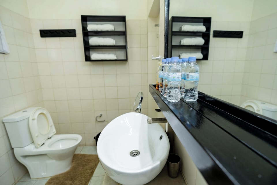 Standard Single Room | Bathroom | Slippers, towels