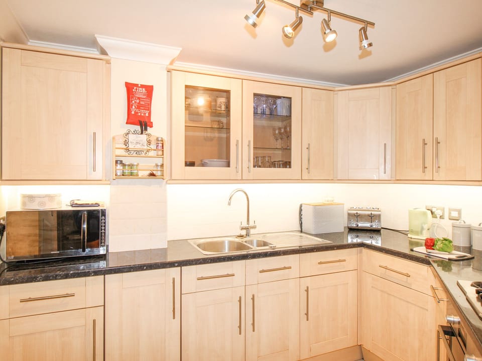 Fridge, electric kettle, toaster, cookware/dishes/utensils