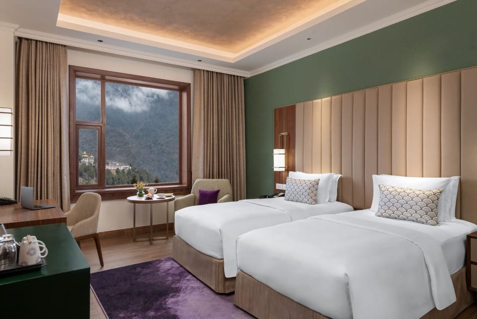 Deluxe Room, 1 Twin Bed | Minibar, in-room safe, laptop workspace, soundproofing