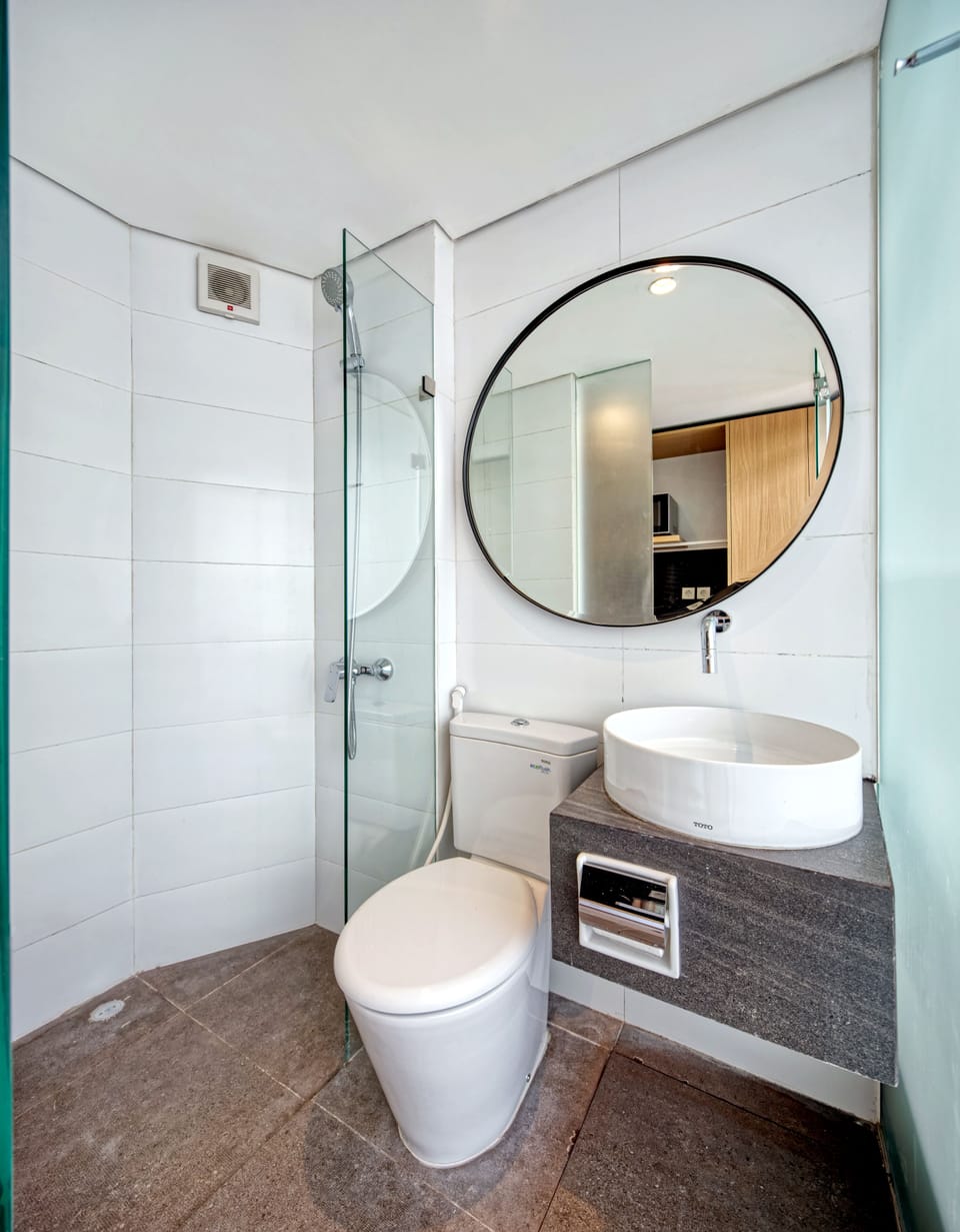 Shower, free toiletries, hair dryer, slippers