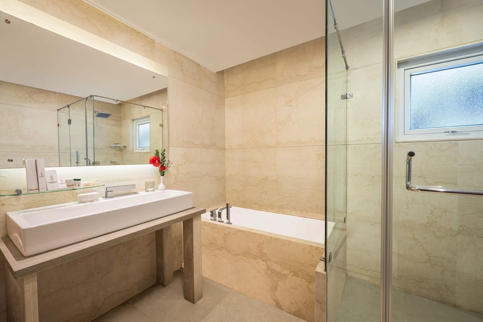 Presidential Suite | Bathroom | Bathtub, hair dryer, bathrobes, slippers