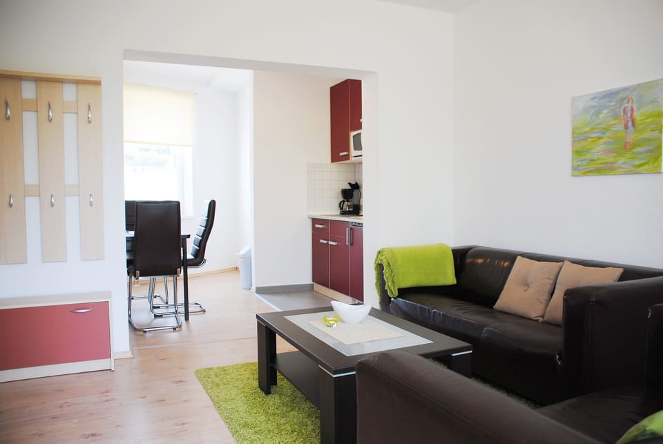 Condo, 1 Bedroom | Living area | 80-cm flat-screen TV with satellite channels, TV, table tennis