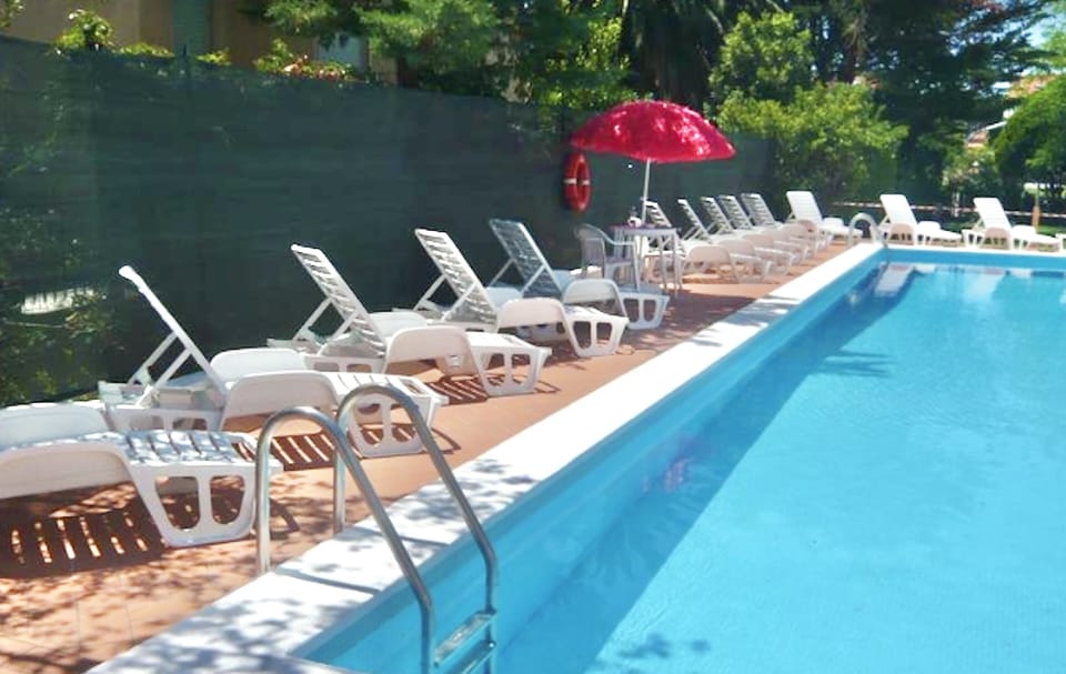 Seasonal outdoor pool, pool umbrellas, sun loungers