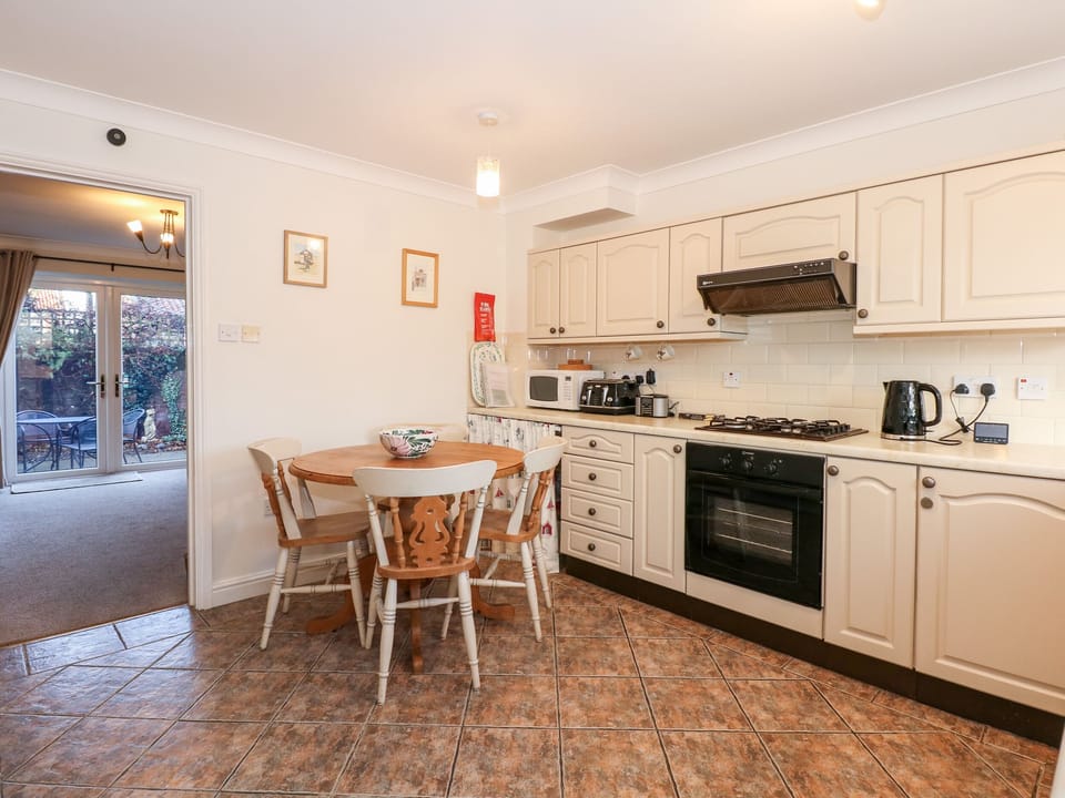 Fridge, electric kettle, toaster, cookware/dishes/utensils