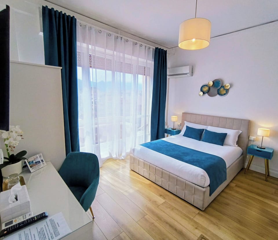 Deluxe Double Room | Desk, laptop workspace, blackout drapes, iron/ironing board