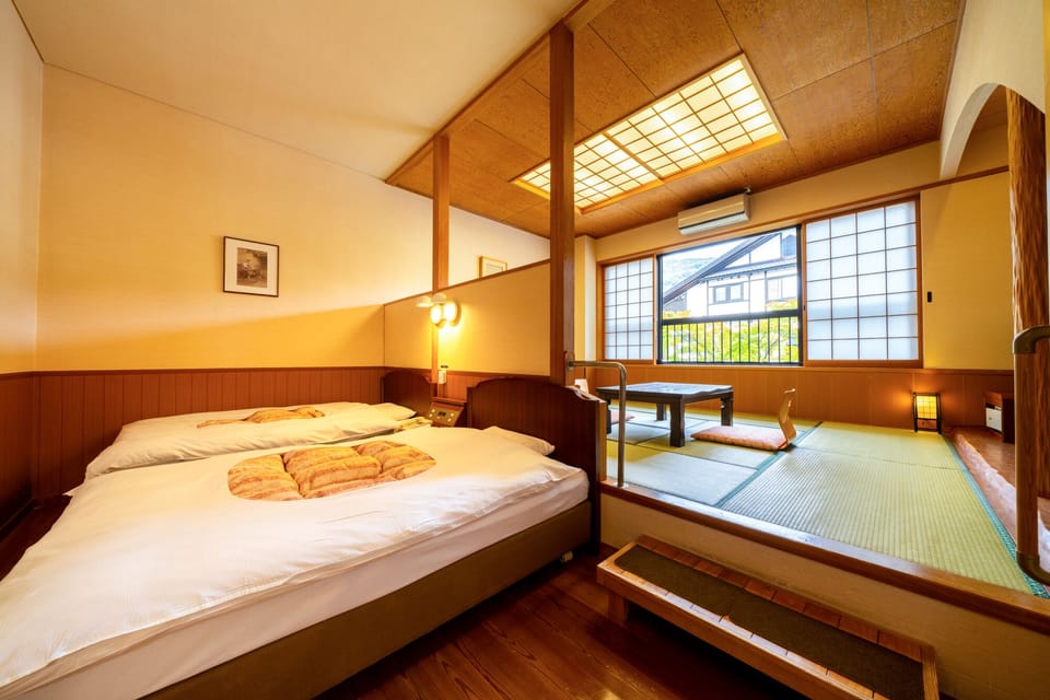 Japanese-Western Style room, 2 Single Beds with Tatami room (27 sqm) | In-room safe, desk, laptop workspace, blackout drapes