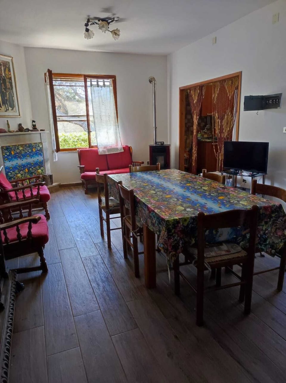 Family Villa | Living area | 32-inch flat-screen TV with cable channels