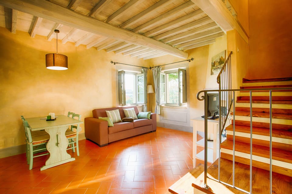 Apartment | Living area | 24-inch flat-screen TV with cable channels, fireplace