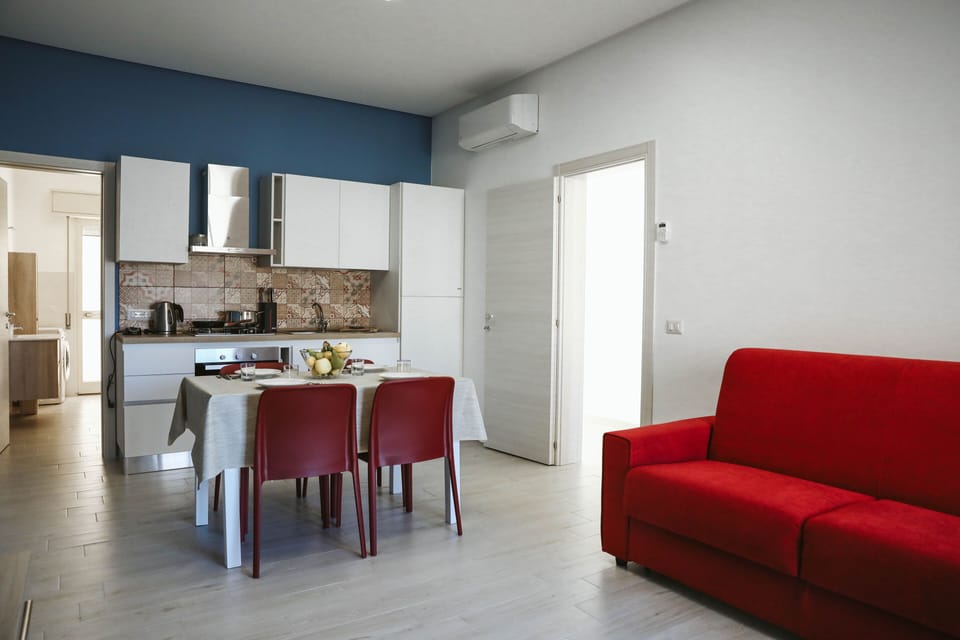 Comfort Apartment | Private kitchen | Full-size fridge, electric kettle, cookware/dishes/utensils