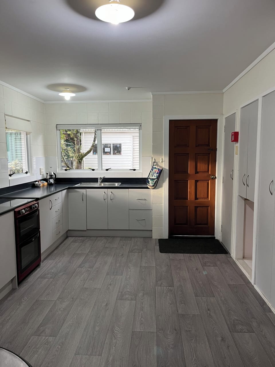 Two Bedroom Unit with Courtyard | Private kitchen | Shared fridge, microwave, highchair