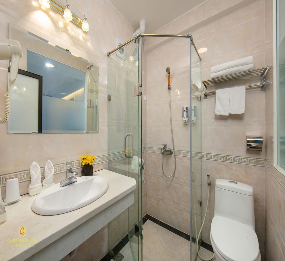 Triple Room | Bathroom | Shower, hair dryer, slippers, towels