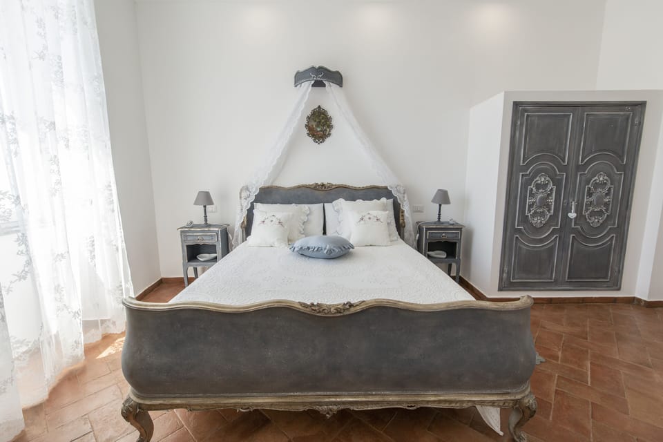 Luxury Double Room, 1 Double Bed, Private Bathroom | Down comforters, minibar, blackout drapes, iron/ironing board