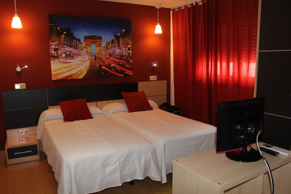 Standard Triple Room, Private Bathroom | Blackout drapes, iron/ironing board, free cribs/infant beds, free WiFi
