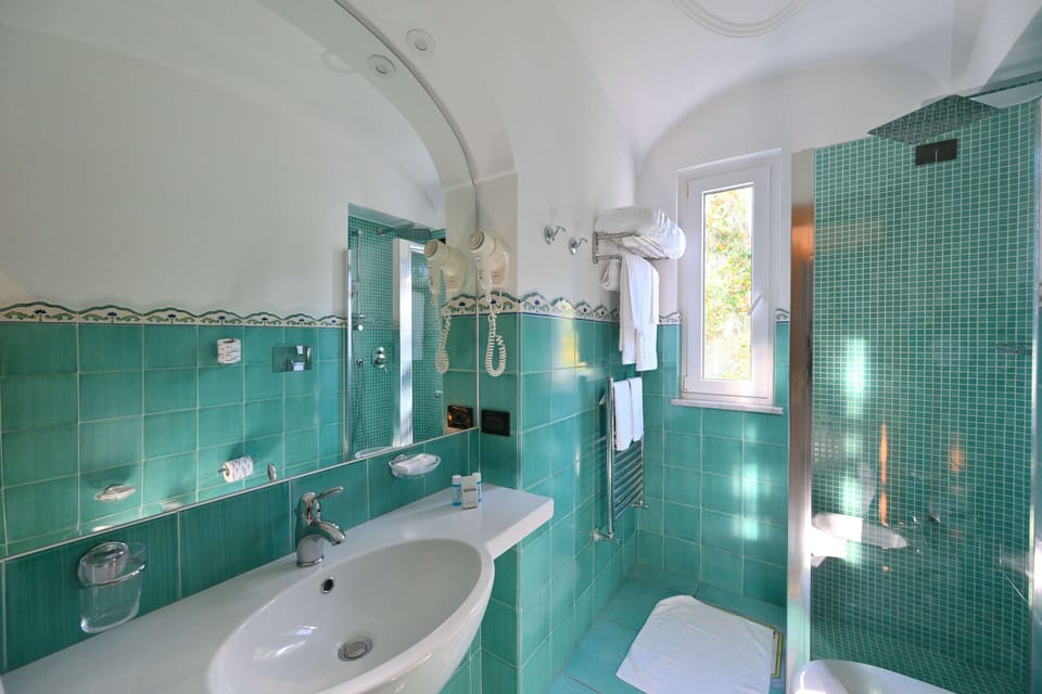 Superior Double or Twin Room, Balcony, Mountain View | Bathroom | Shower, hair dryer, bathrobes, slippers