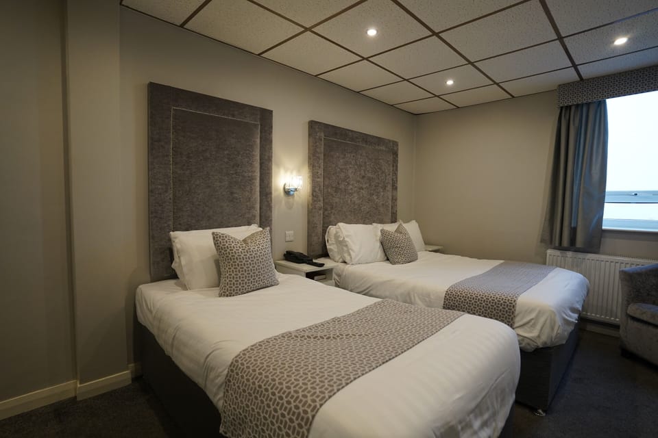 Family Room | Iron/ironing board, free WiFi, bed sheets