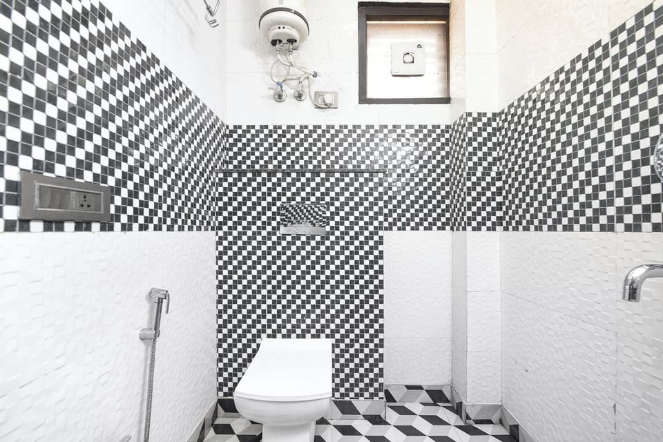 Shower, rainfall showerhead, towels, toilet paper