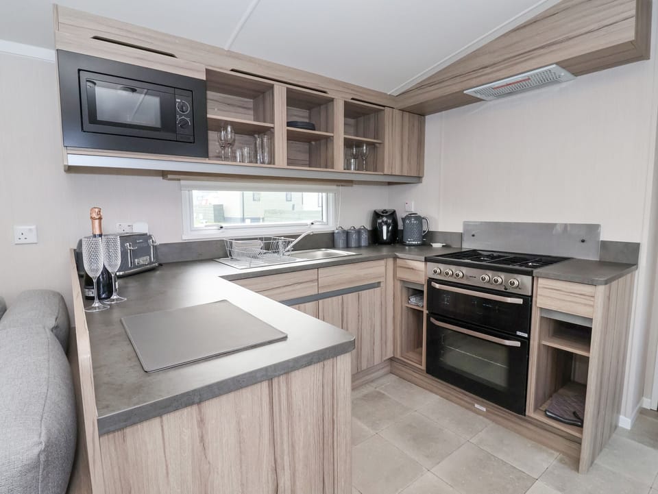 Fridge, electric kettle, toaster, cookware/dishes/utensils
