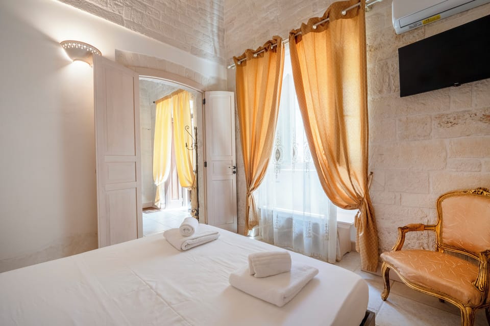 Traditional Duplex | Premium bedding, down comforters, desk, soundproofing