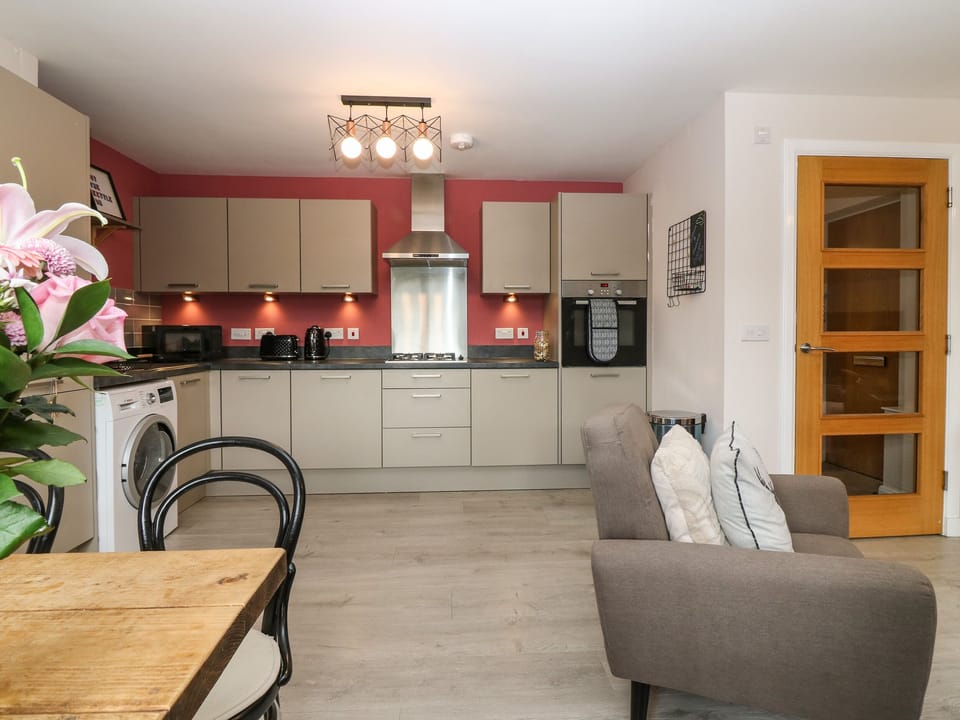 Fridge, electric kettle, toaster, cookware/dishes/utensils