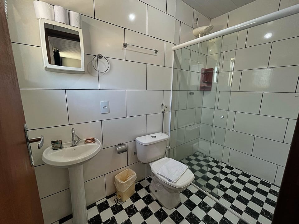 Basic Apartment | Bathroom | Shower, rainfall showerhead, towels, soap