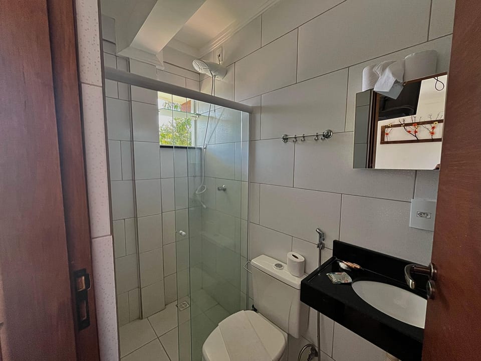Basic Chalet | Bathroom | Shower, rainfall showerhead, towels, soap