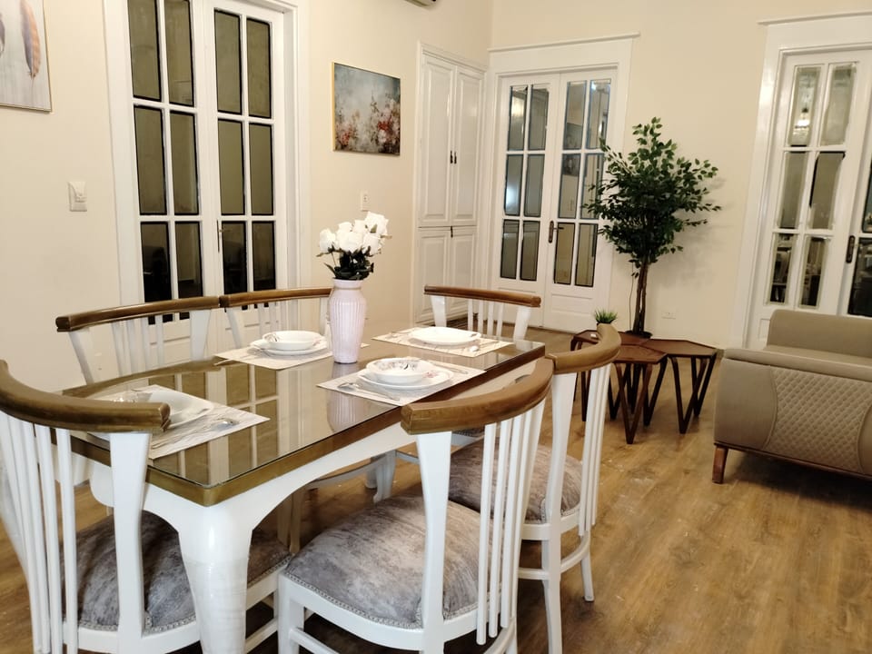 Superior Apartment | Living area | Flat-screen TV