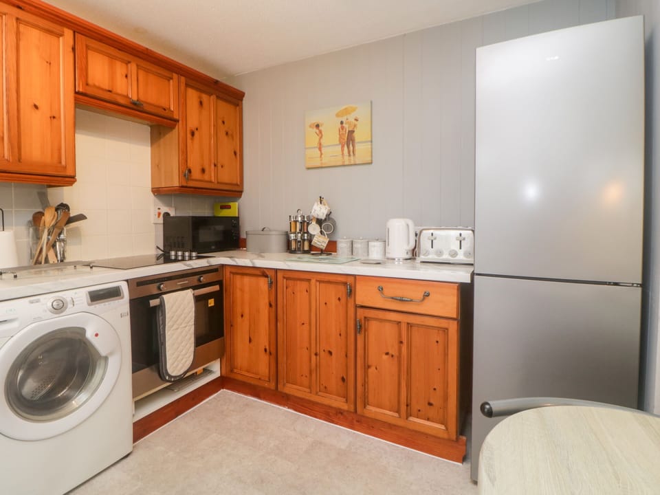 Fridge, electric kettle, toaster, cookware/dishes/utensils