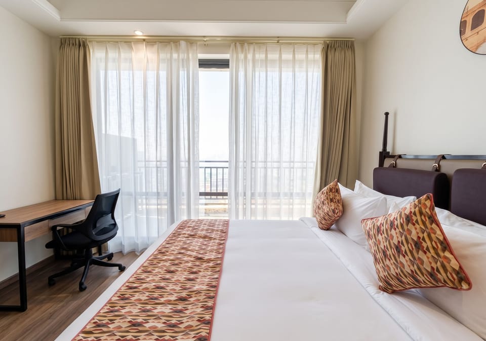 Deluxe Suite with Living Room, with Complimentary Hi-Tea & 1 Pint of Beer | City view