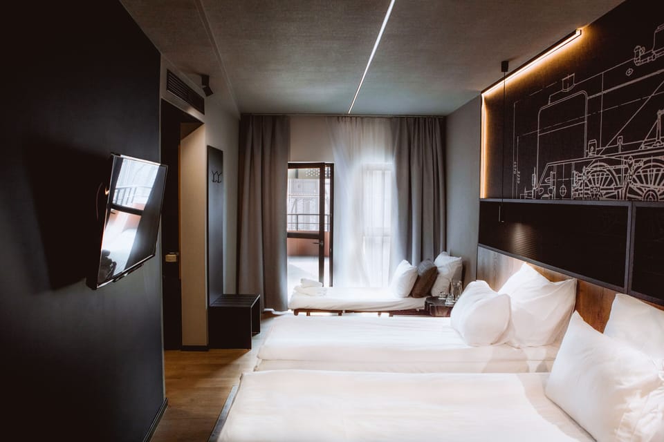 Deluxe Double or Twin Room | Minibar, in-room safe, individually decorated, desk