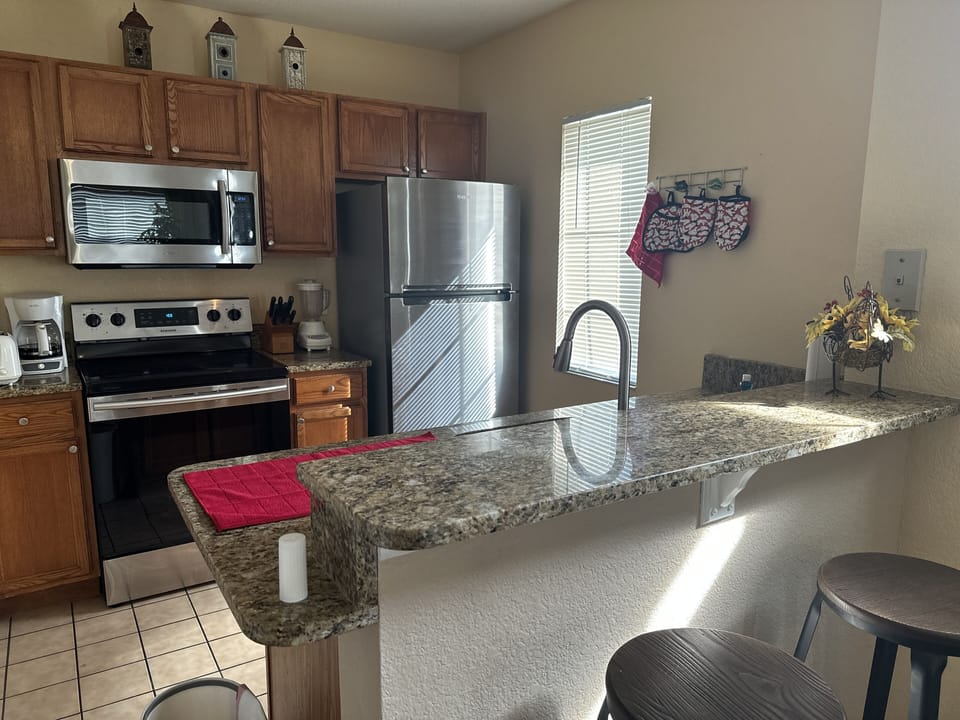 Full-size fridge, microwave, blender
