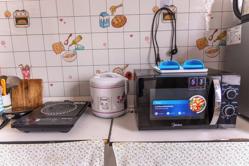 Mini-fridge, microwave, electric kettle, dining tables