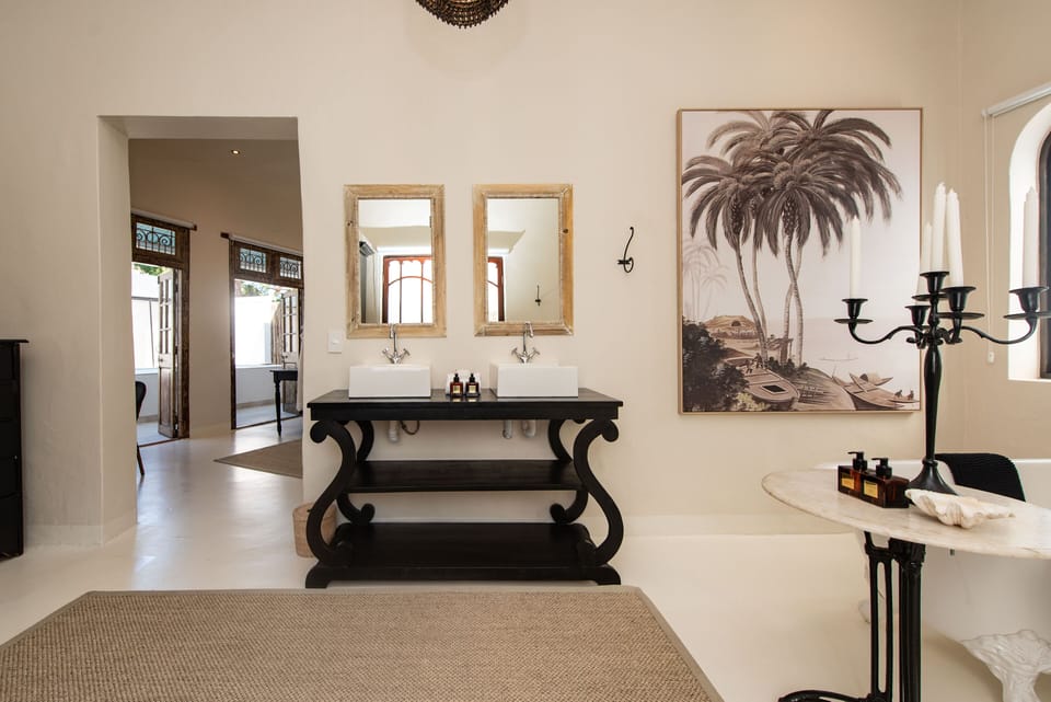 Honeymoon Suite | Bathroom | Hair dryer, bathrobes, slippers, towels