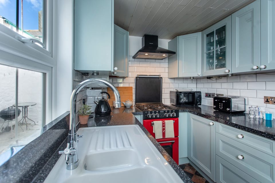 Fridge, electric kettle, toaster, cookware/dishes/utensils