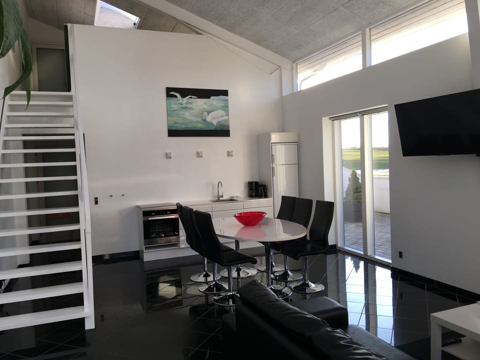 Suite, 2 Bedrooms (120 m2) | Private kitchen | Coffee/tea maker, electric kettle, dining tables