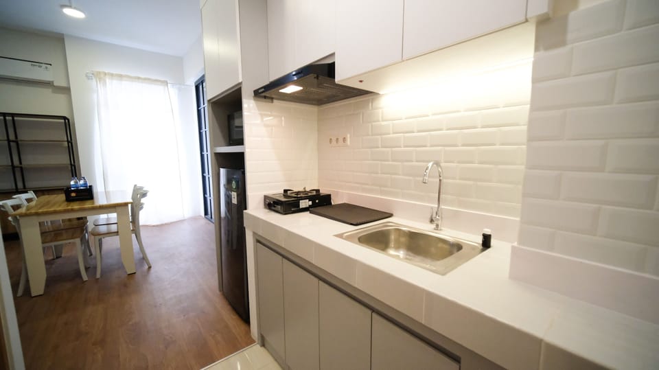 Apartment | Private kitchen | Full-size fridge, stovetop