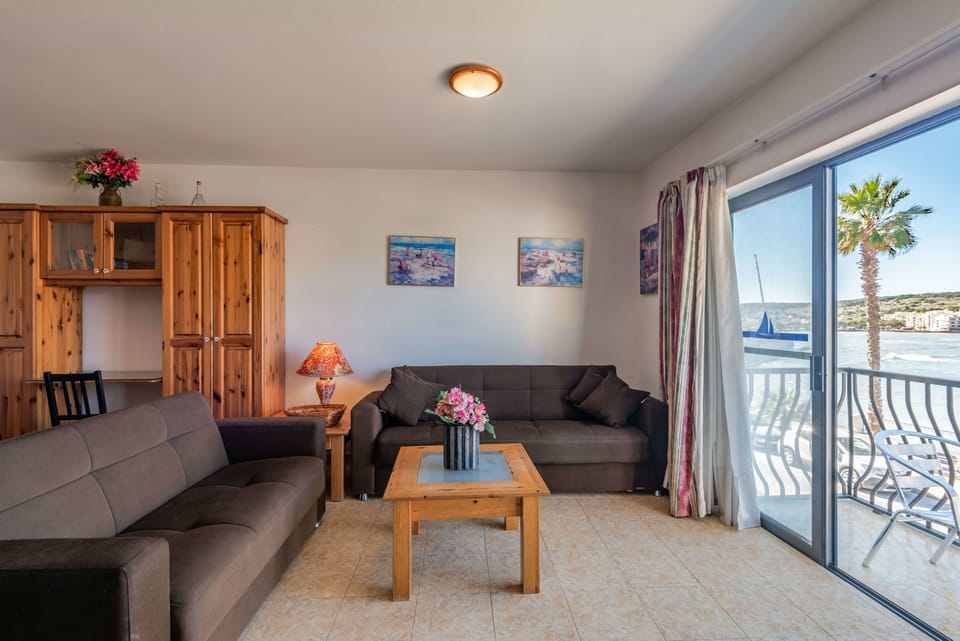 Standard Apartment, 2 Bedrooms, Sea View | Living area | Flat-screen TV