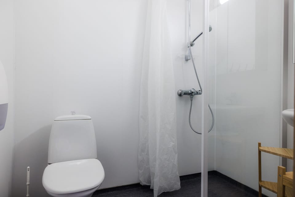 Family Quadruple Room | Bathroom | Shower, eco-friendly toiletries, soap, toilet paper