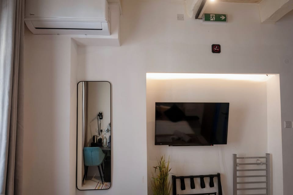Deluxe Room, 1 Bedroom, Balcony, City View - 4th Floor (4A) | Television