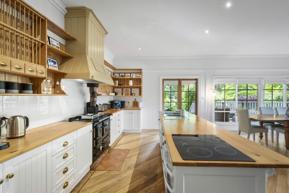 Deluxe House | Private kitchen | Espresso maker, coffee/tea maker, full-size fridge, microwave