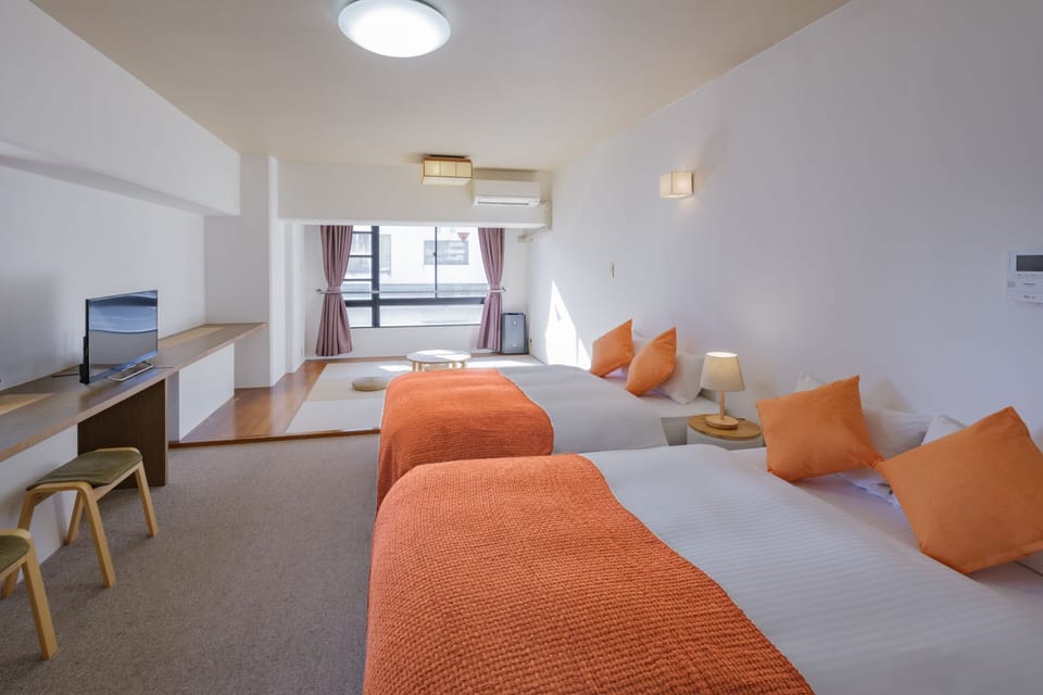Deluxe Room, Tatami (2Semi-Double Beds and 2Single Futon) Non-Smoking - Cleaning Fee Extra | WiFi (free), bed sheets