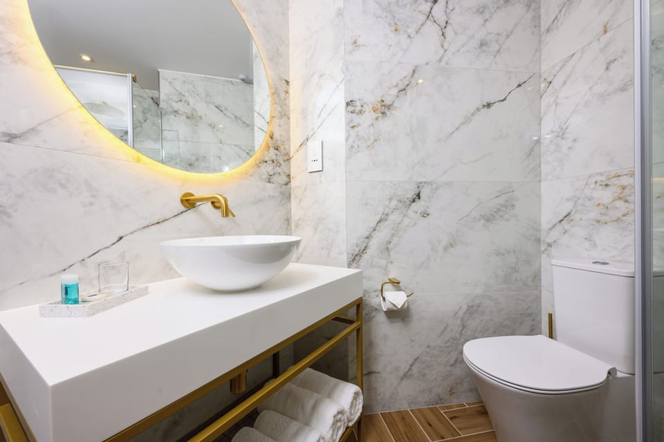 Standard Double Room | Bathroom | Shower, rainfall showerhead, hair dryer, bathrobes