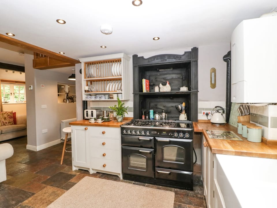 Fridge, electric kettle, toaster, cookware/dishes/utensils