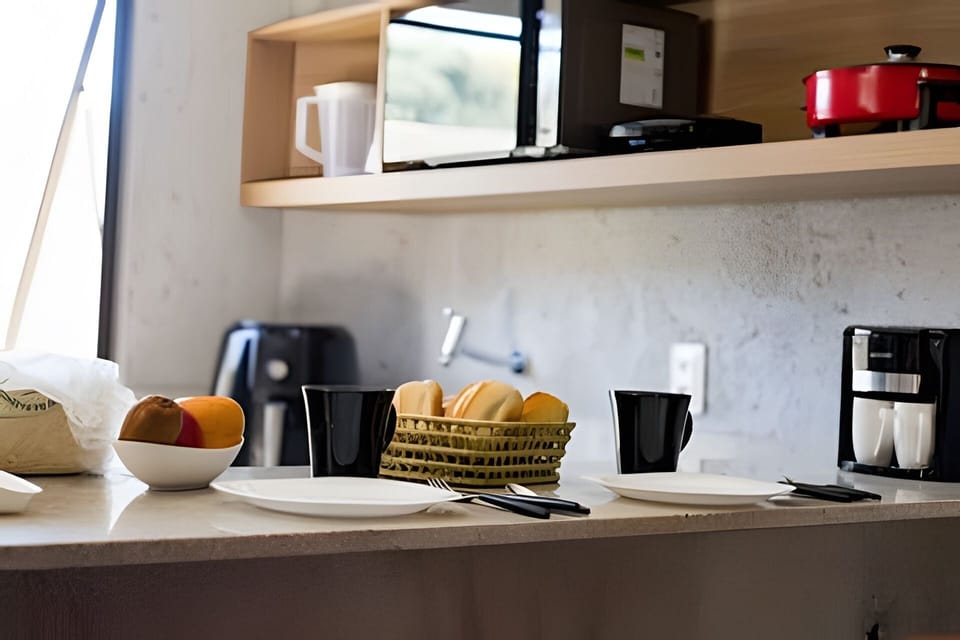 Villa | Private kitchen | Microwave, stovetop, blender, cookware/dishes/utensils