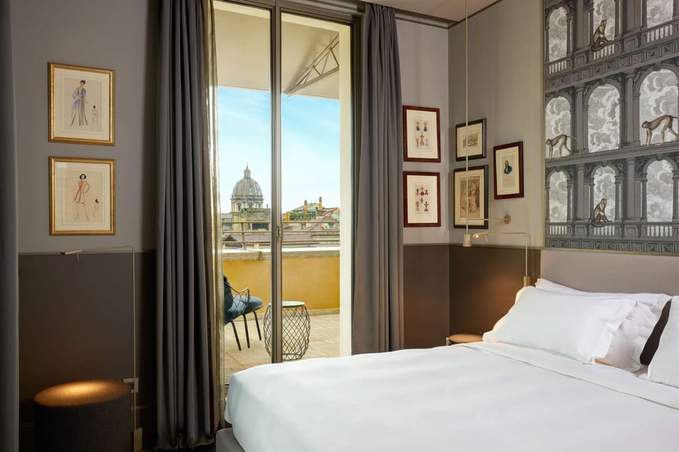 Junior Suite, 1 Bedroom, Terrace, City View | Minibar, in-room safe, blackout drapes, soundproofing
